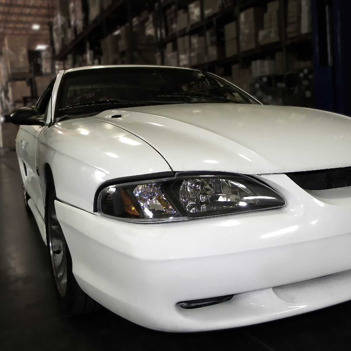 1994-1998 Ford Mustang SN95 1PC Crystal Headlights w/ Amber Reflectors (Matte Black Housing / Clear Lens)