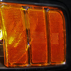 1999-2004 Ford Mustang New Edge Projector Headlights w/ Amber Reflectors (Matte Black Housing / Clear Lens)