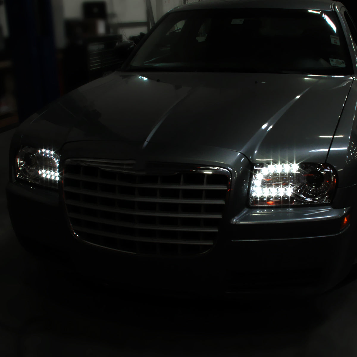 2005-2010 Chrysler 300 Base/LX/Touring Projector Headlights w/ LED Light Strip & LED Turn Signal Lights (Chrome Housing / Clear Lens)