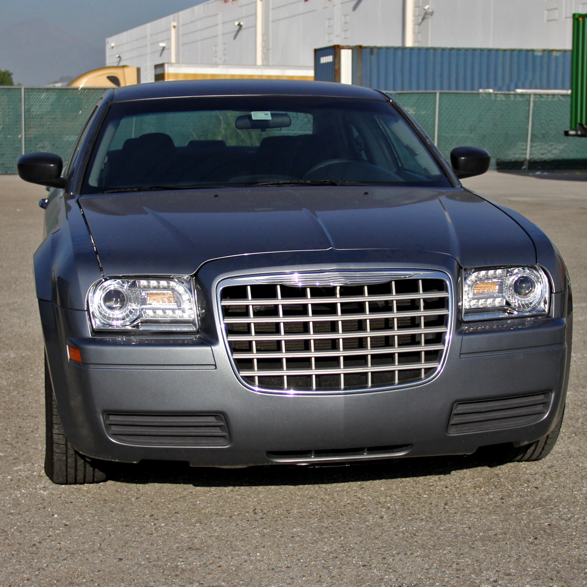 2005-2010 Chrysler 300 Base/LX/Touring Projector Headlights w/ LED Light Strip & LED Turn Signal Lights (Chrome Housing / Clear Lens)