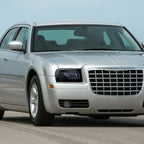 2005-2010 Chrysler 300 Base/LX/Touring Projector Headlights w/ LED Light Strip & LED Turn Signal Lights (Glossy Black Housing / Smoked Lens)