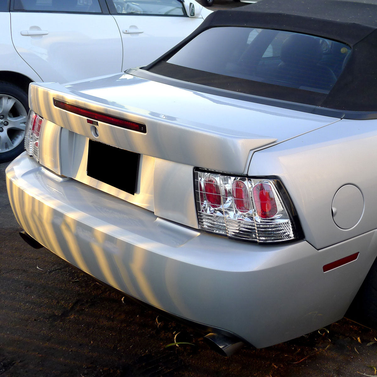 1999-2004 Ford Mustang New Edge Tail Lights (Chrome Housing / Clear Lens)