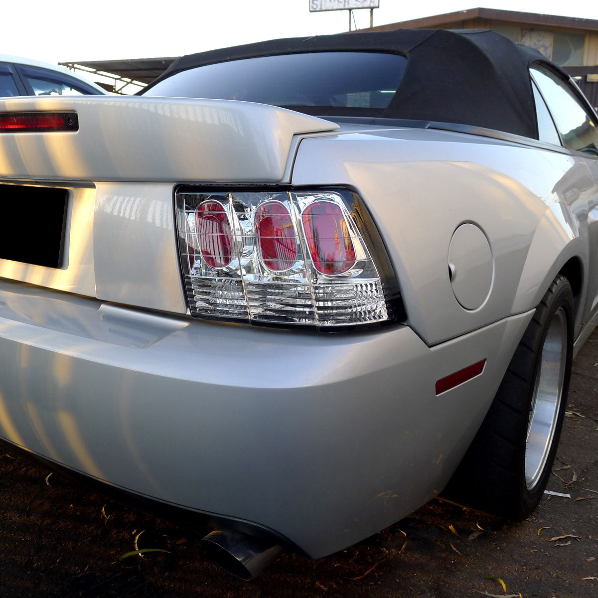 1999-2004 Ford Mustang New Edge Tail Lights (Chrome Housing / Clear Lens)