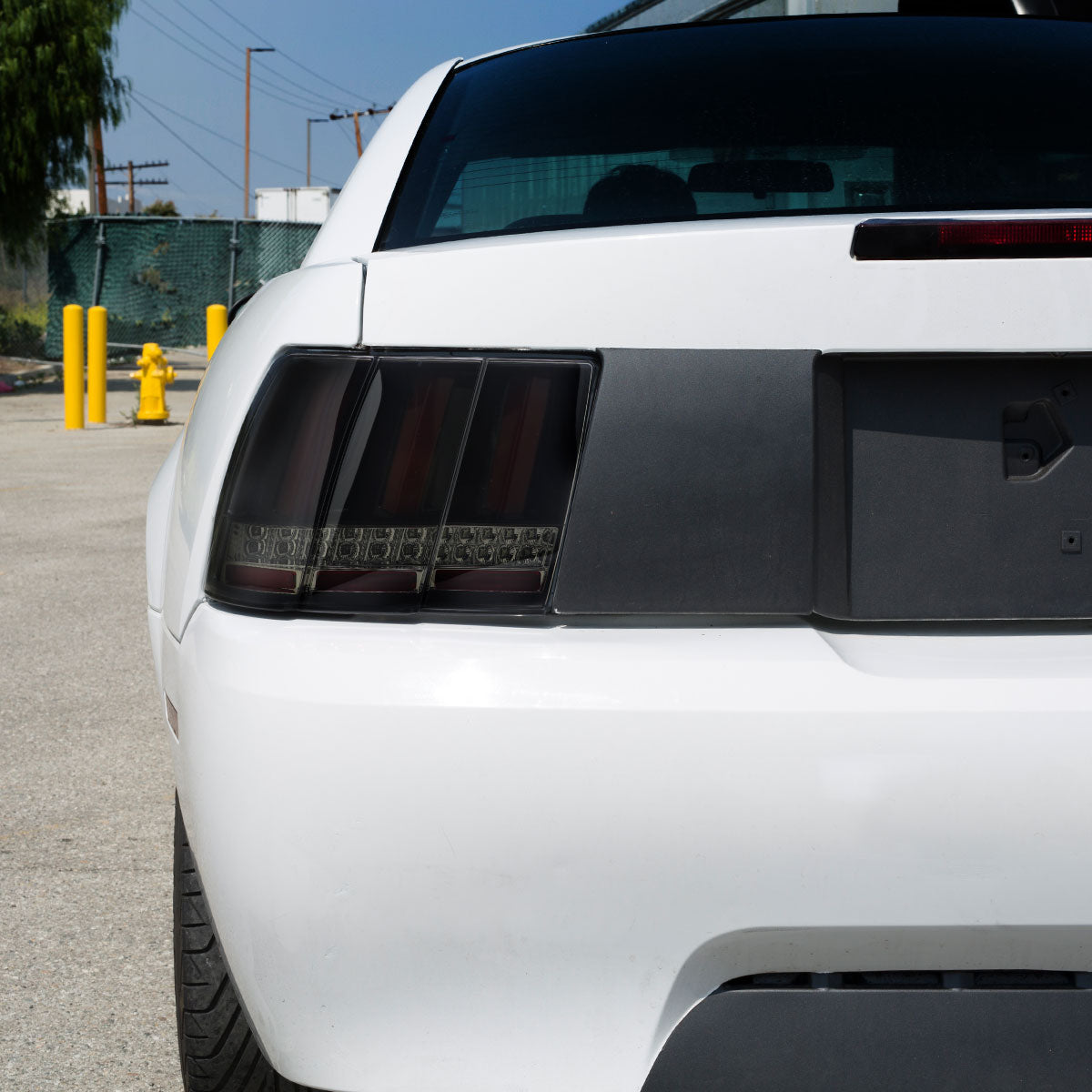 1999-2004 Ford Mustang New Edge Red Marker Sequential LED Tail Lights (Glossy Black Housing / Smoked Lens)